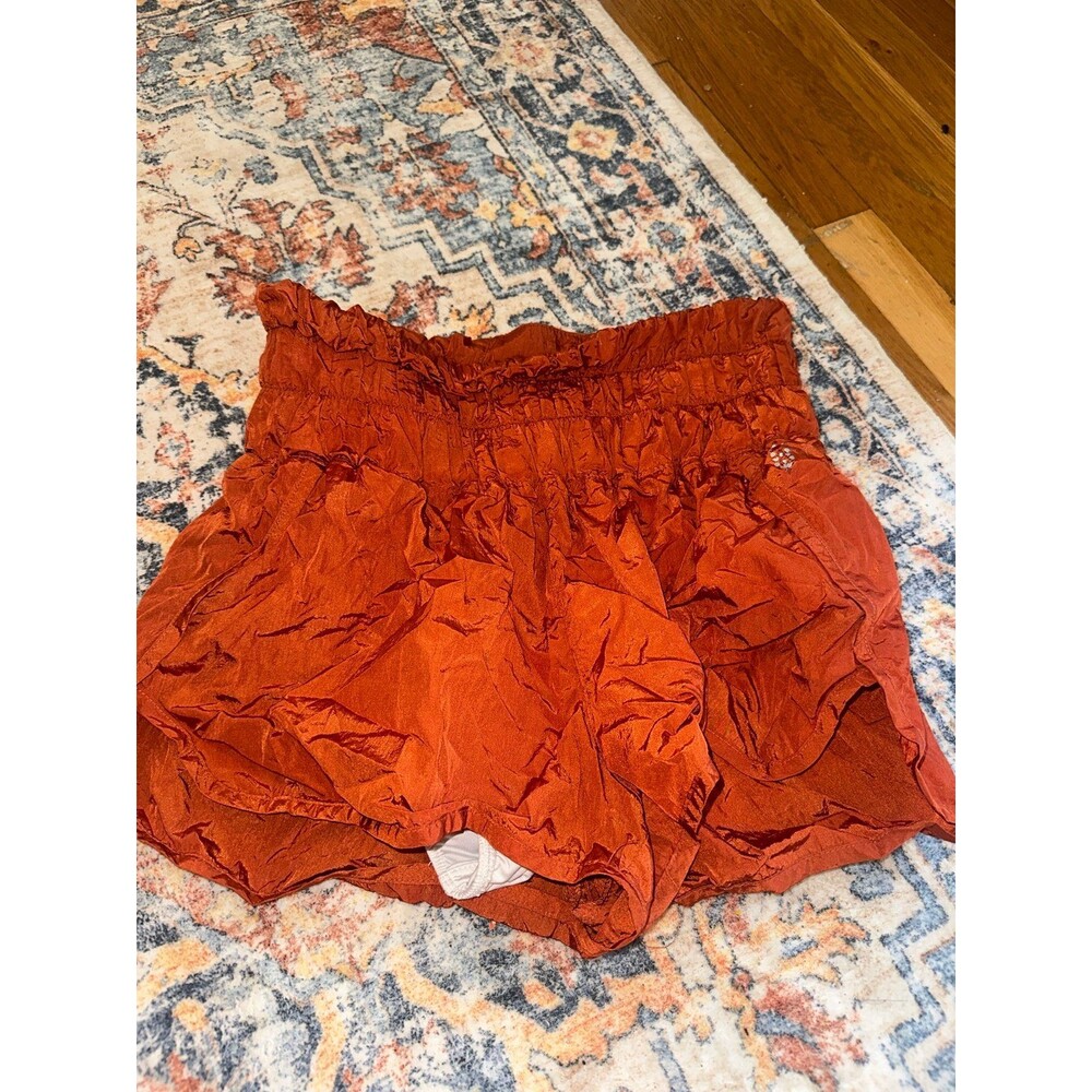 Free people orange running shorts